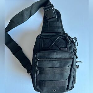 NWOT small  Tactical sling backpack outdoor bag in black.